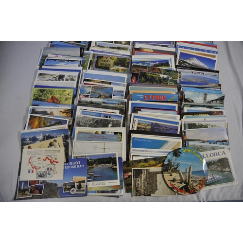 257 - BOX OF POSTAL ENVELOPES WITH STAMPS AND BOX OF POSTCARDS WITH STAMPS