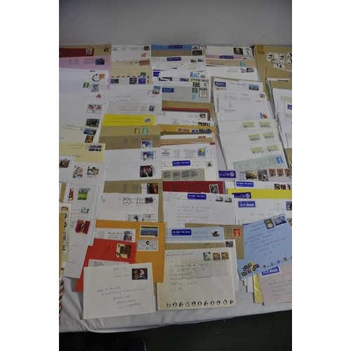 257 - BOX OF POSTAL ENVELOPES WITH STAMPS AND BOX OF POSTCARDS WITH STAMPS