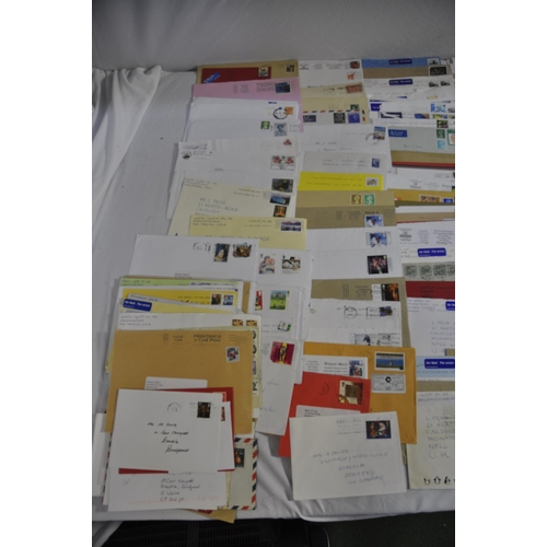 257 - BOX OF POSTAL ENVELOPES WITH STAMPS AND BOX OF POSTCARDS WITH STAMPS