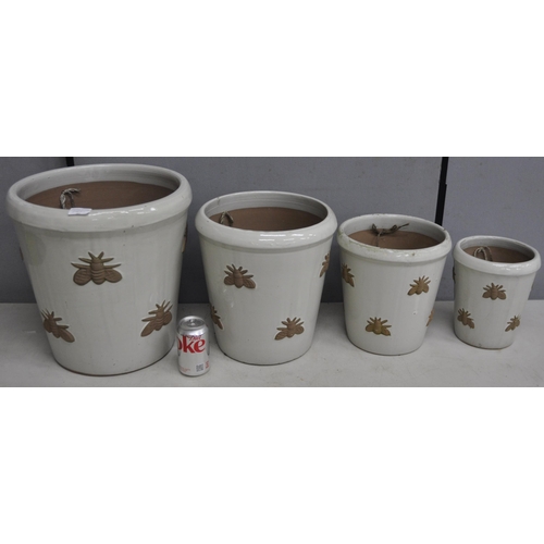 272 - SET OF 4 GRADUATED BEE DESIGN PLANTERS