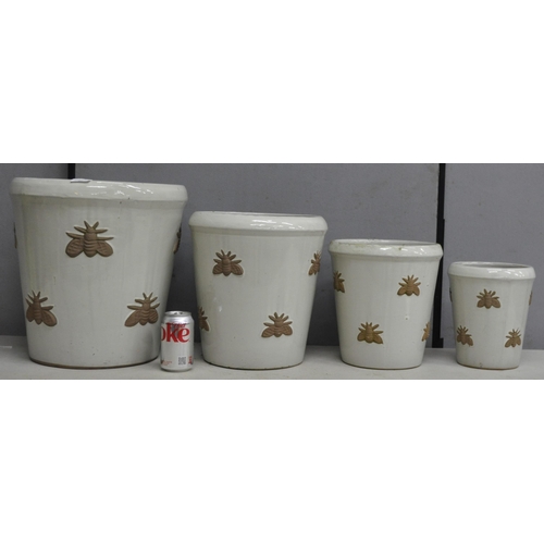 272 - SET OF 4 GRADUATED BEE DESIGN PLANTERS