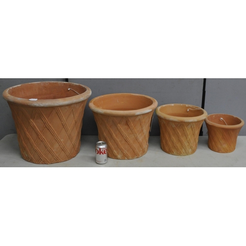 279 - SET OF 4 TERRACOTTA GRADUATED BASKET WEAVE PLANTERS