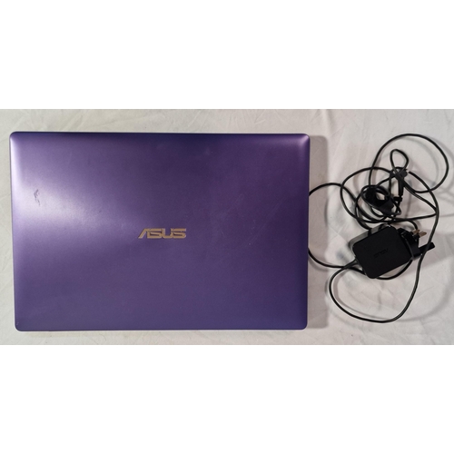 287 - PURPLE ASUS NOTEBOOK WITH CHARGER IN DELL CARRY BOX (MODEL X5536) WITH WINDOWS 10 - FAULTY BATTERY W... 