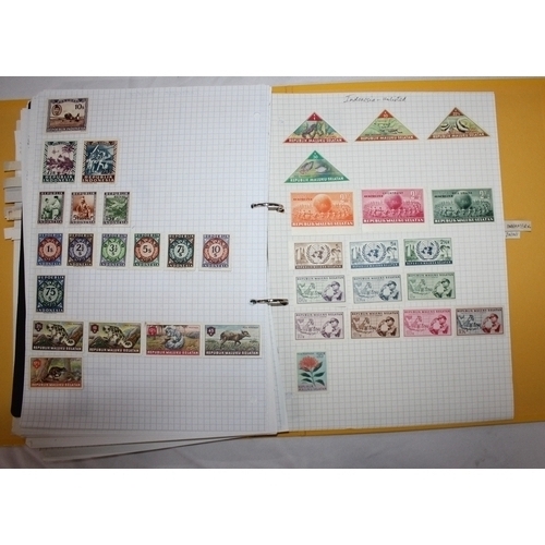 304 - 6 FOLDERS OF FOREIGN STAMPS