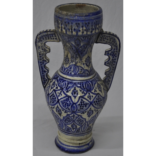 65 - TALL BLUE AND WHITE TWO HANDLED VASE 16