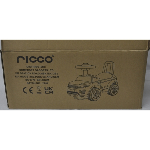 114 - NEW AND BOXED RICCO PINK/PURPLE RIDE-ON CAR - OPTION OF LOTS 115 & 116