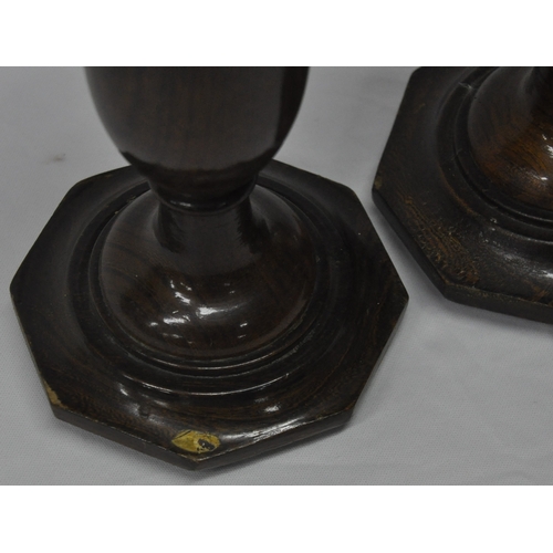 102 - 2 PAIR WOODEN CANDLE STICKS