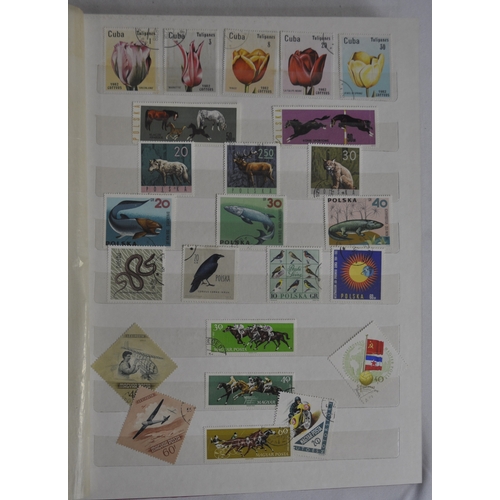 104 - 4 STAMP ALBUMS INCLUDING USA STAMPS