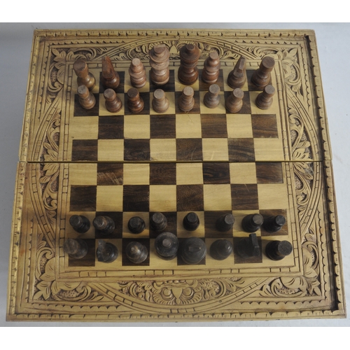 106 - 2 CHESSBOARDS COMPLETE WITH PIECES AND 2 VINTAGE DUNLOP TENNIS RACQUETS