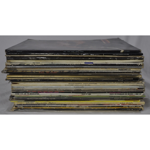 124 - 40 VARIOUS VINYL RECORDS