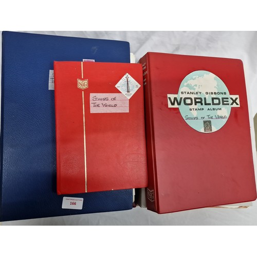 166 - 7 STAMP ALBUMS - STAMPS OF THE WORLD