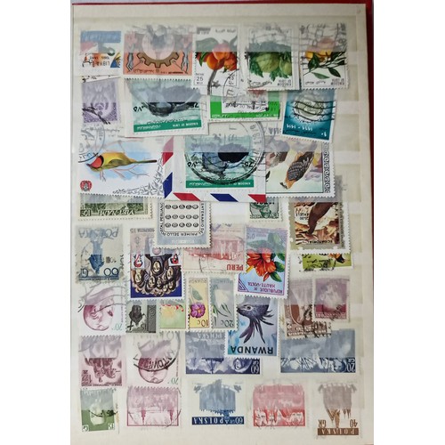 166 - 7 STAMP ALBUMS - STAMPS OF THE WORLD