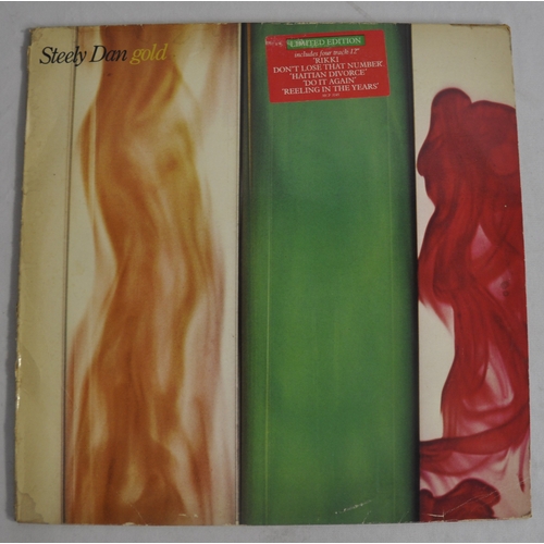 292 - 2 STEELY DAN VINYL RECORDS - PRETZEL LOGIC 1974 PROBE SBA 6282 AND GOLD LIMITED EDITION MCF 3145