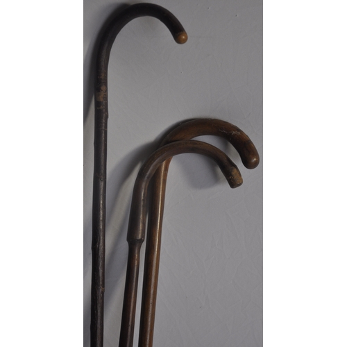 300 - GLASS UMBRELLA STAND WITH 3 WALKING STICKS