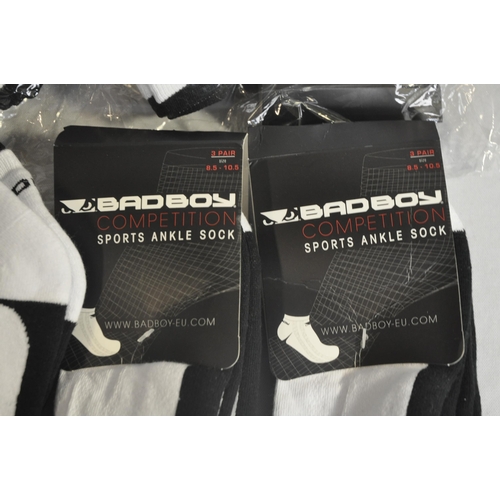 323 - 6 PACKS OF 3 PLUS 2 PAIRS BAD BOY BLACK/WHITE ANKLE SOCKS & PACK OF 2 KARRIMOR ANKLE SOCKS. SIZE... 