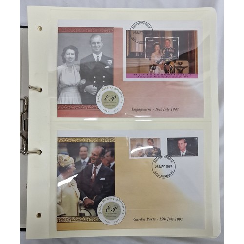 333 - 2 ALBUMS OF  COMMEMORATIVE FIRST DAY COVERS OF THE ROYAL FAMILY