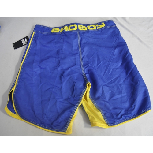 354 - 4 PAIR BAD BOY MMA SHORTS BLUE/YELLOW (2 SIZE XXL & 2 SIZE XXXL) (A60)