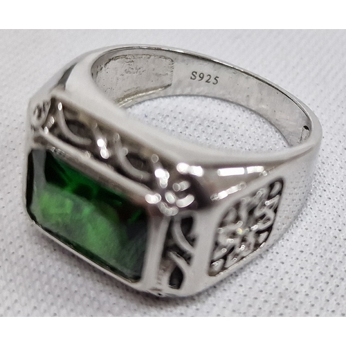 230 - SILVER COLOURED RING WITH GREEN GEM MARKED S925