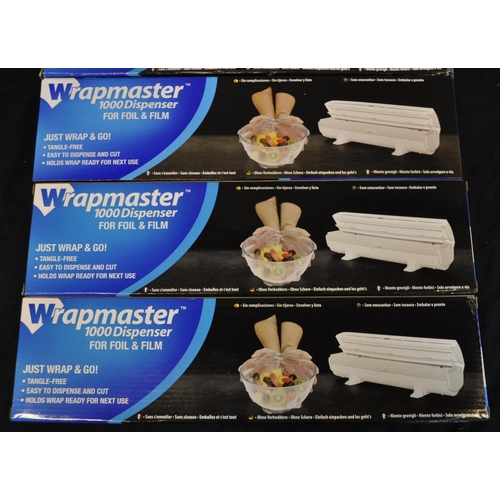 65 - 4 WRAPMASTER 1000 DISPENSERS - FOR FILM AND FOIL.  WITH OPTION OF LOTS 66 AND 67