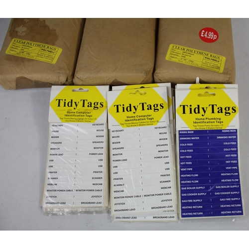 112 - CRATE OF CLEAR POLYTHENE BAGS, TIDY TAGS AND CARDBOARD SHEETS