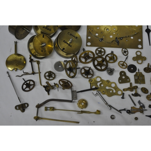 BOX OF BRASS CLOCK PARTS