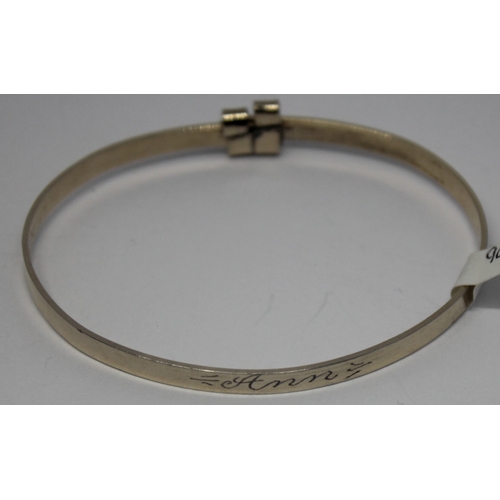 GOLD COLOURED BABY BANGLE ENGRAVED 'ANN' 5.3g