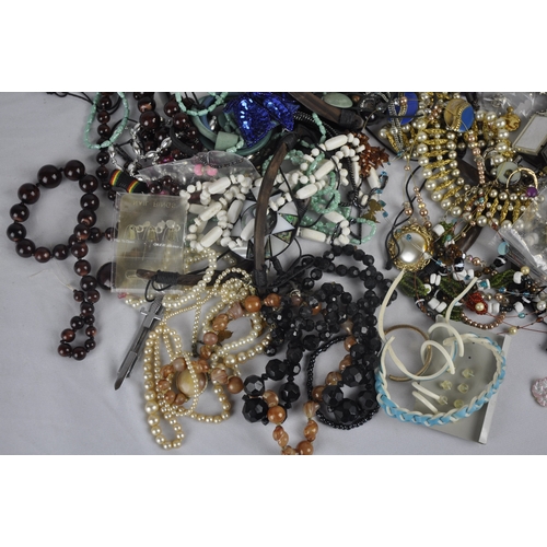 198 - 2 TUBS OF COSTUME JEWELLERY