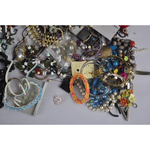 198 - 2 TUBS OF COSTUME JEWELLERY