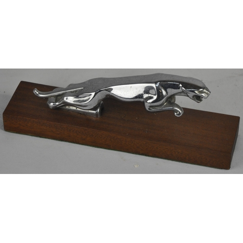 216 - JAGUAR CAR MASCOT MOUNTED ON WOODEN PLINTH