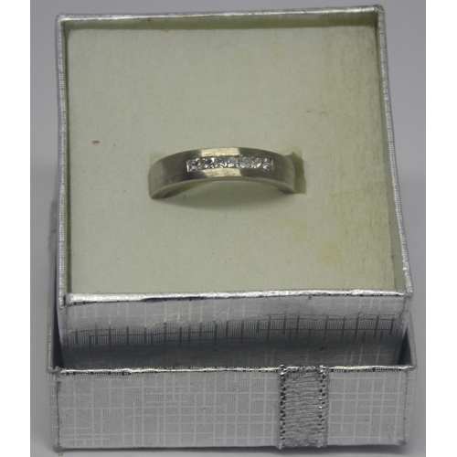 218 - 9ct WHITE GOLD BAND SET DIAMONDS (6g) SIZE N