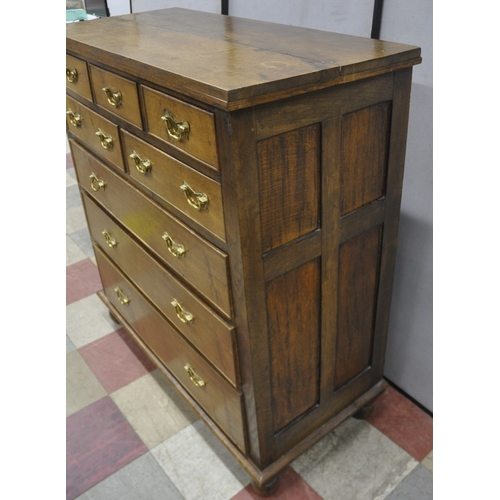 152 - OAK 8 DRAWER CHEST WITH GRADUATED DRAWERS AND BRASS DROP HANDLES