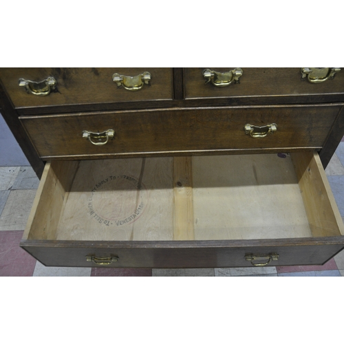 152 - OAK 8 DRAWER CHEST WITH GRADUATED DRAWERS AND BRASS DROP HANDLES