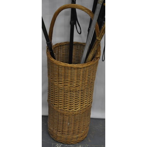 212 - WICKER UMBRELLA STAND WITH QUANTITY OF WALKING STICKS