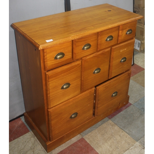 246 - PINE 9 DRAWER CHEST - 4 DRAWERS, OVER 3, OVER 2 WITH CUP HANDLES (40cm x 88cm x 89cm)