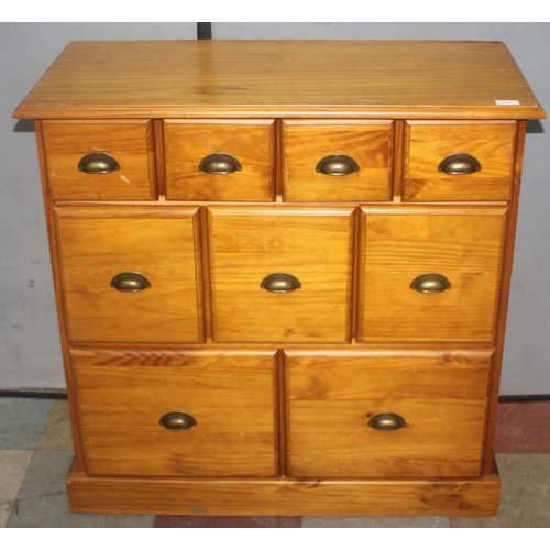 250 - PINE 9 DRAWER CHEST - 4 DRAWERS, OVER 3, OVER 2 WITH CUP HANDLES (40cm x 88cm x 89cm)