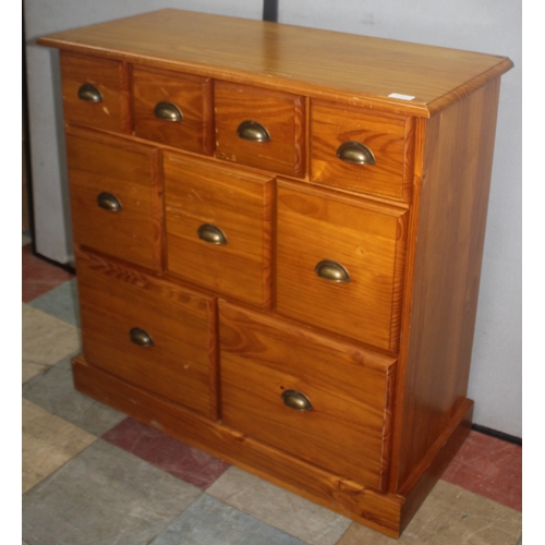 250 - PINE 9 DRAWER CHEST - 4 DRAWERS, OVER 3, OVER 2 WITH CUP HANDLES (40cm x 88cm x 89cm)