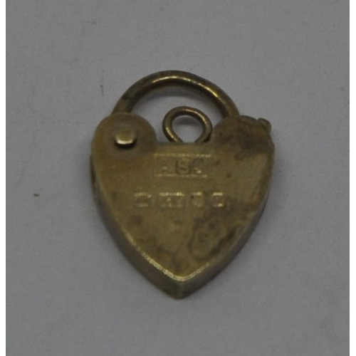 286 - 9ct GOLD PADLOCK 0.8g