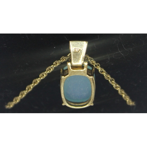 301 - GOLD PENDANT AND CHAIN MARKED 375 SET WITH DIAMONDS AND BLUE/GREEN STONE IN BLACK BOX 5.5g