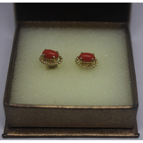 307 - ORANGE STONE GOLD COLOURED STUDS IN BROWN PRESENTATION BOX