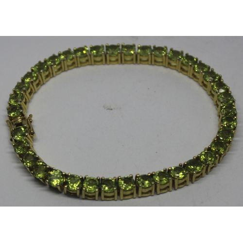 224 - SILVER GILT GEMS TV PERIDOT BRACELET (21G)