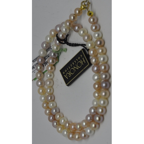 254 - 9CT GOLD CLASP NATURAL HONORA PEARL NECKLACE 16INCH