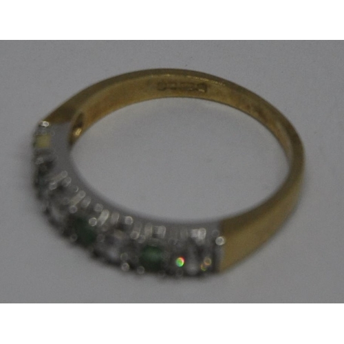 286 - 9ct GOLD RING SET WITH ROW OF GEMSTONES SIZE M 1.9g