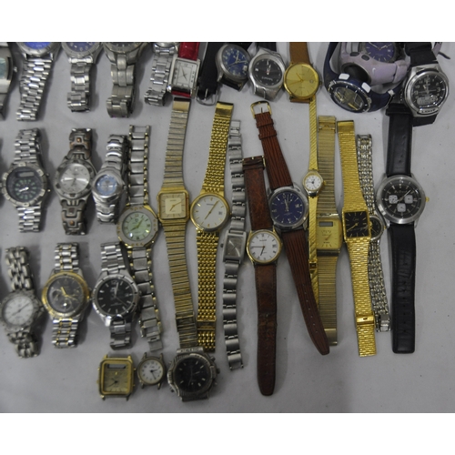 21 - TIN OF WATCHES - NOT TESTED