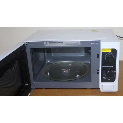 25 - TOSHIBA MICROWAVE OVEN - WORKING