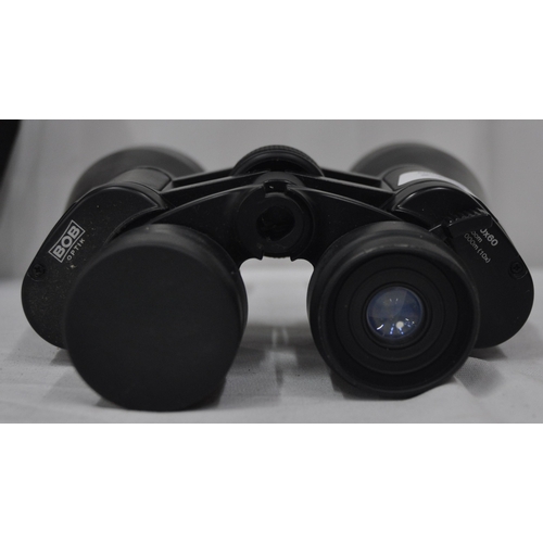 49 - PAIR OF BOB OPTIK 10-30x60 BINOCULARS