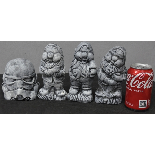 99 - 4 GARDEN ORNAMENTS - 3 DWARFS AND A STORM TROOPER