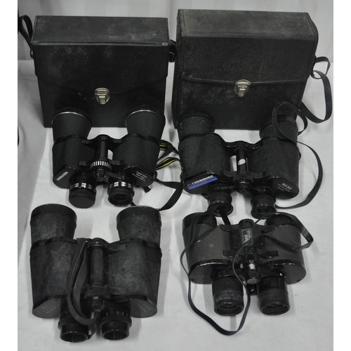 151 - CASE CONTAINING 8 PAIR OF BINOCULARS