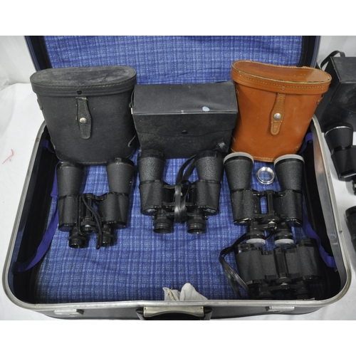 151 - CASE CONTAINING 8 PAIR OF BINOCULARS