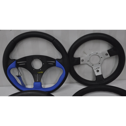 177 - 4 NEW LUISI STEERING WHEELS - 2 IN BLACK AND BLUE AND 2 IN BLACK