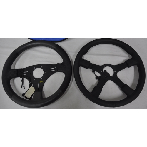 177 - 4 NEW LUISI STEERING WHEELS - 2 IN BLACK AND BLUE AND 2 IN BLACK